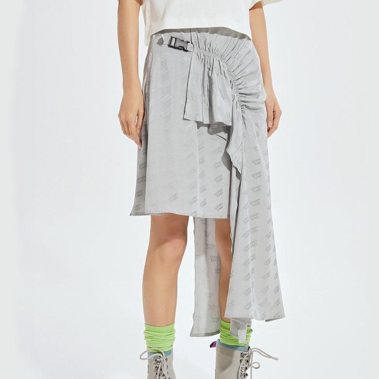 A stylish, contemporary skirt with unique asymmetrical design and adjustable belt, perfect for fashion-forward individuals. Features a versatile blend of comfort and trendy details for casual or chic outfits.