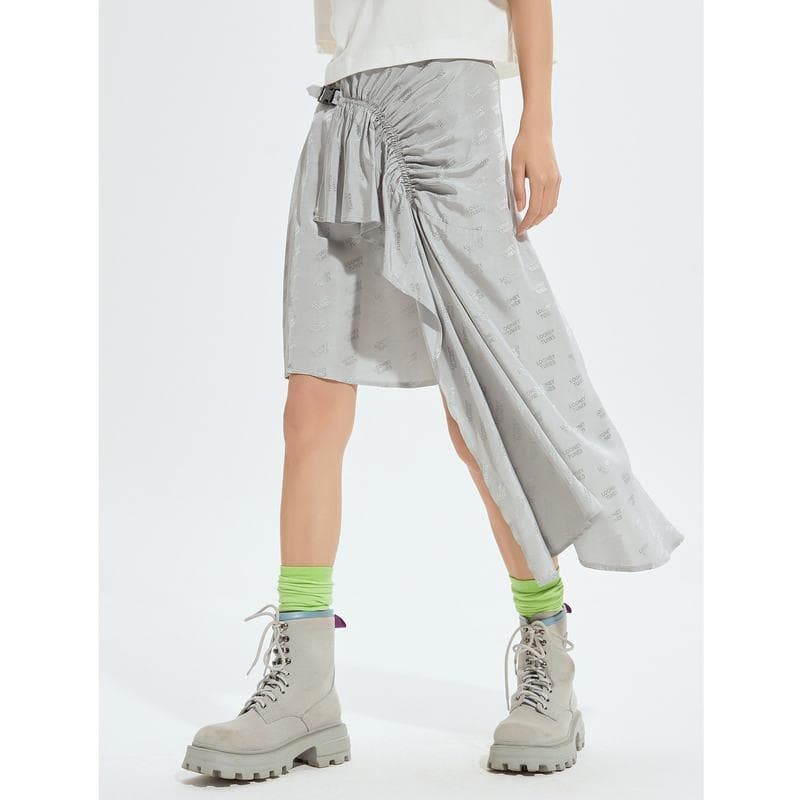 Elegant metallic skirt with asymmetrical drape for modern style.