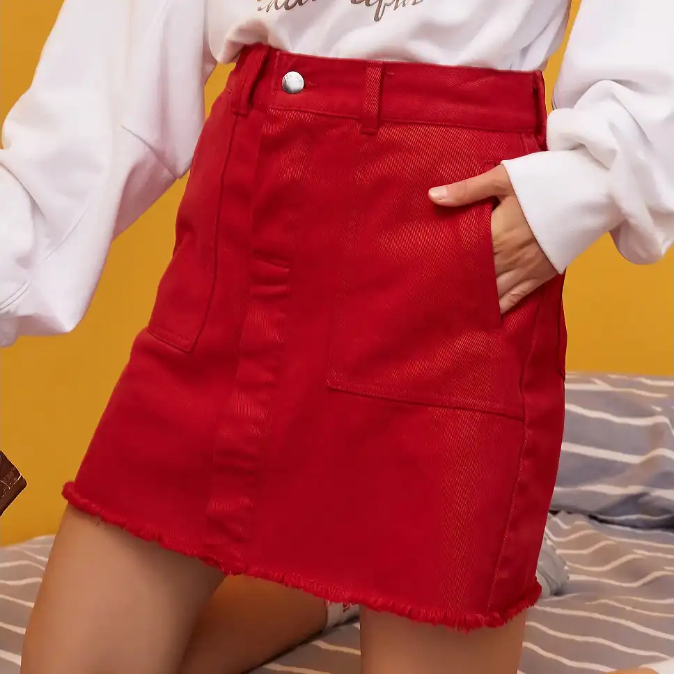 High-quality red denim skirt with a classic front pocket, frayed hem, and comfortable fit, perfect for casual or trendy outfits. Shop the latest fashion at Monalisa Store.