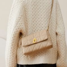 Elegant beige quilted leather handbag with gold clasp and strap, perfect for women's fashion and accessories, showcasing a stylish and versatile piece available at Monalisa Store.