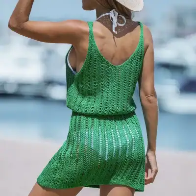 Women’s green crochet summer dress for beach, poolside, or vacation wear. Breathable, lightweight, and fashionable open-knit cover-up perfect for sunny days.
