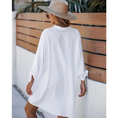 Comfortable white beach cover-up dress, perfect for summer vacations and beach outings, stylish and lightweight for an effortlessly chic look.