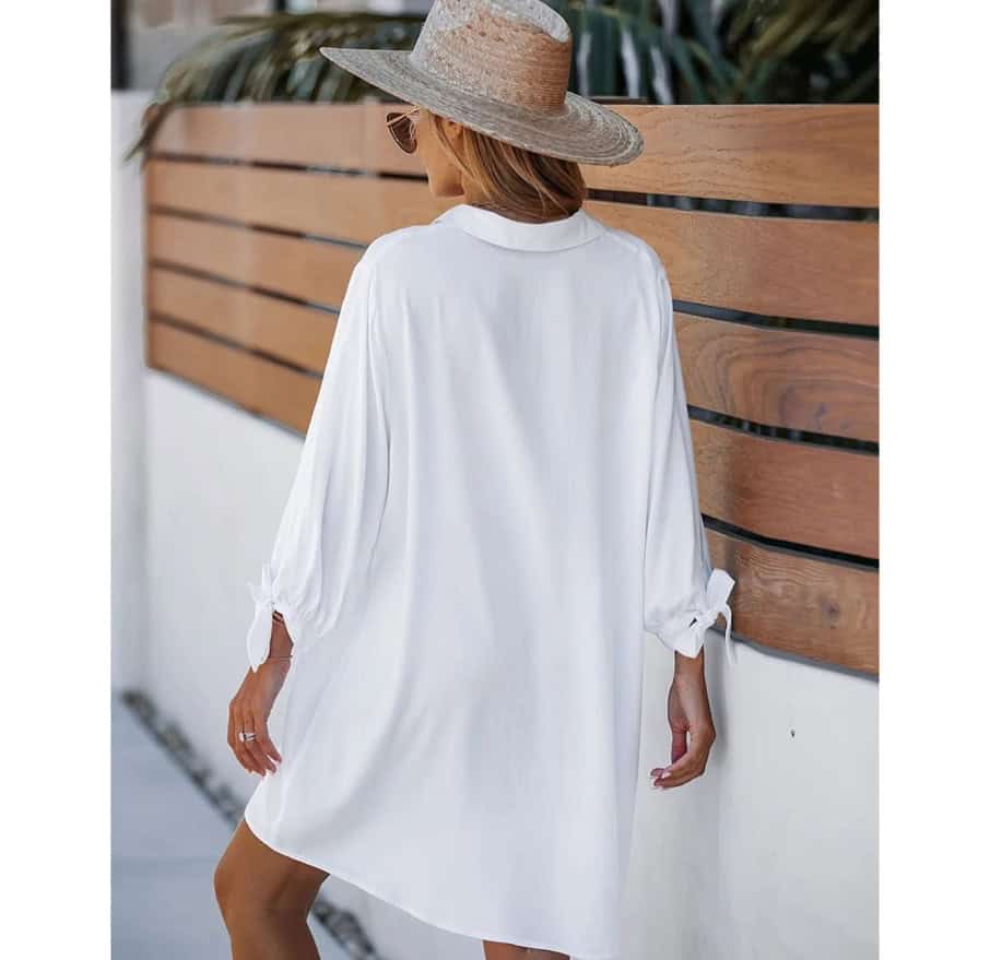 Comfortable white beach cover-up dress, perfect for summer vacations and beach outings, stylish and lightweight for an effortlessly chic look.