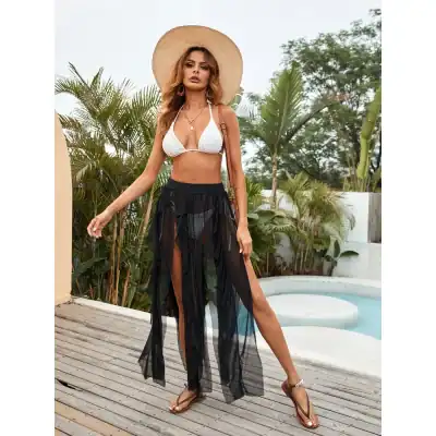 High-quality, fashionable cover-up with sheer black fabric perfect for beach or poolside fashion. Coordinates with bikinis and swimsuits for an elegant summer look.
