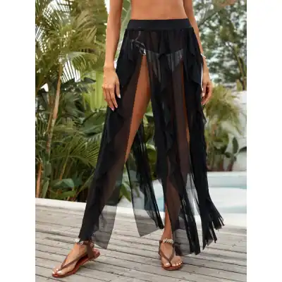 Loose black sheer cover-up with ruffle details, perfect for beach or poolside fashion. Lightweight and trendy, ideal for stylish swimwear to enhance your summer look.