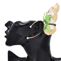 Stylish butterfly-shaped gold ear cuff with green and white enamel accents and sparkling crystals for a chic, modern jewelry statement.