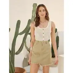 Stylish cotton sleeveless top paired with a distressed hem skirt, perfect for trendy casual wear.