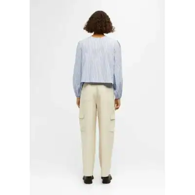 Comfortable women's casual clothing from Monalisa Store, featuring a striped blouse and beige cargo pants perfect for everyday wear and stylish comfort.