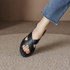 High-quality black sandal featuring a sleek design, perfect for casual and fashionable wear, ideal for women seeking comfort and style in everyday footwear.