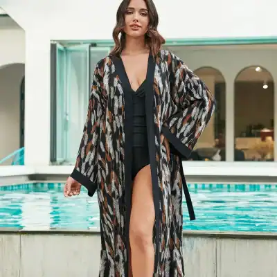 Stylish printed beachwear kimono with lightweight fabric, perfect for poolside or resort wear, available at Monalisa Store.