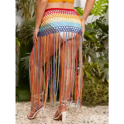 Vibrant crochet skirt with multicolored fringes perfect for summer fashion and beach wear. Stylish, comfortable, and eye-catching clothing for fashion-forward individuals.