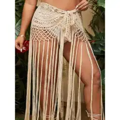 A stylish and breathable crochet beach coverup with long fringe details, perfect for summer seaside outings and poolside lounging. Embrace beach fashion with this elegant, comfortable, and trendy piece.