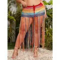 Colorful crochet beach cover-up with long rainbow-colored fringe, ideal for summer and beachwear. Stylish and breathable, perfect for vacation or poolside fashion.
