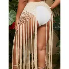 High-quality crochet beach cover-up with long hanging tassels perfect for summer swimsuits. Stylish and comfortable, ideal for beachwear and resort fashion.