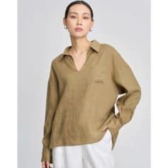 Elegant beige linen blouse for women with a classic collar and relaxed fit, perfect for casual or office wear. Made from breathable, sustainable fabric, offering comfort and style.