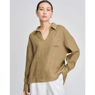 Elegant beige linen blouse for women with a classic collar and relaxed fit, perfect for casual or office wear. Made from breathable, sustainable fabric, offering comfort and style.