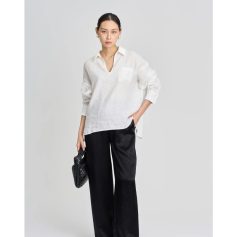 Elegant women's white blouse with a pocket, long sleeves, and a V-neck, perfect for professional and casual wear. Crafted with comfortable fabric for versatile styling.