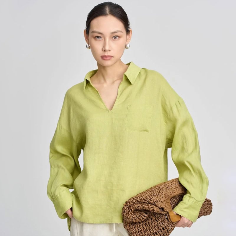 Elegant lime green linen blouse with a collar and relaxed fit, perfect for casual or professional look.