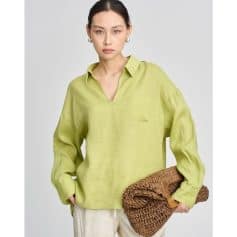 Elegant linen blouse with a classic collar, long sleeves, and a soft lime green color–perfect for stylish, comfortable fashion.