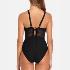 Chic black crochet swimsuit with back cutout, perfect for beach and pool, featuring adjustable straps for a comfortable fit.