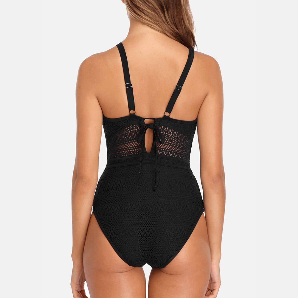 Chic black crochet swimsuit with back cutout, perfect for beach and pool, featuring adjustable straps for a comfortable fit.