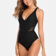 Elegant black one-piece swimsuit featuring breathable mesh panels and comfortable fit. Perfect for poolside lounging, swimming, or summer vacations. Shop now at Monalisa Store for stylish swimwear.