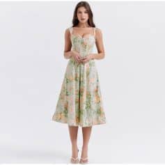 Stylish floral midi dress with a fitted bodice and flowing skirt, ideal for women seeking comfort and elegance.