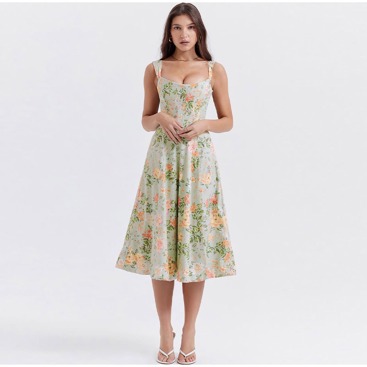 Stylish floral midi dress with a fitted bodice and flowing skirt, ideal for women seeking comfort and elegance.