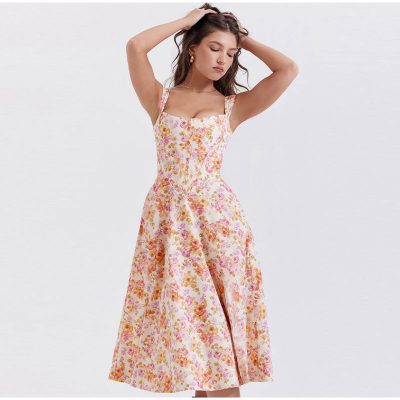 Women’s floral maxi dress with vibrant pink, yellow, and white patterns, perfect for summer and casual occasions, available at Monalisa Store.