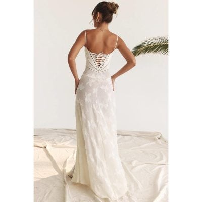 Beautiful white wedding gown featuring intricate lace-up back and floral embroidery design, perfect for special occasions and weddings from Monalisa Store.