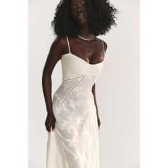 High-quality white floral dress with delicate embroidery, perfect for special occasions or fashion-forward events.