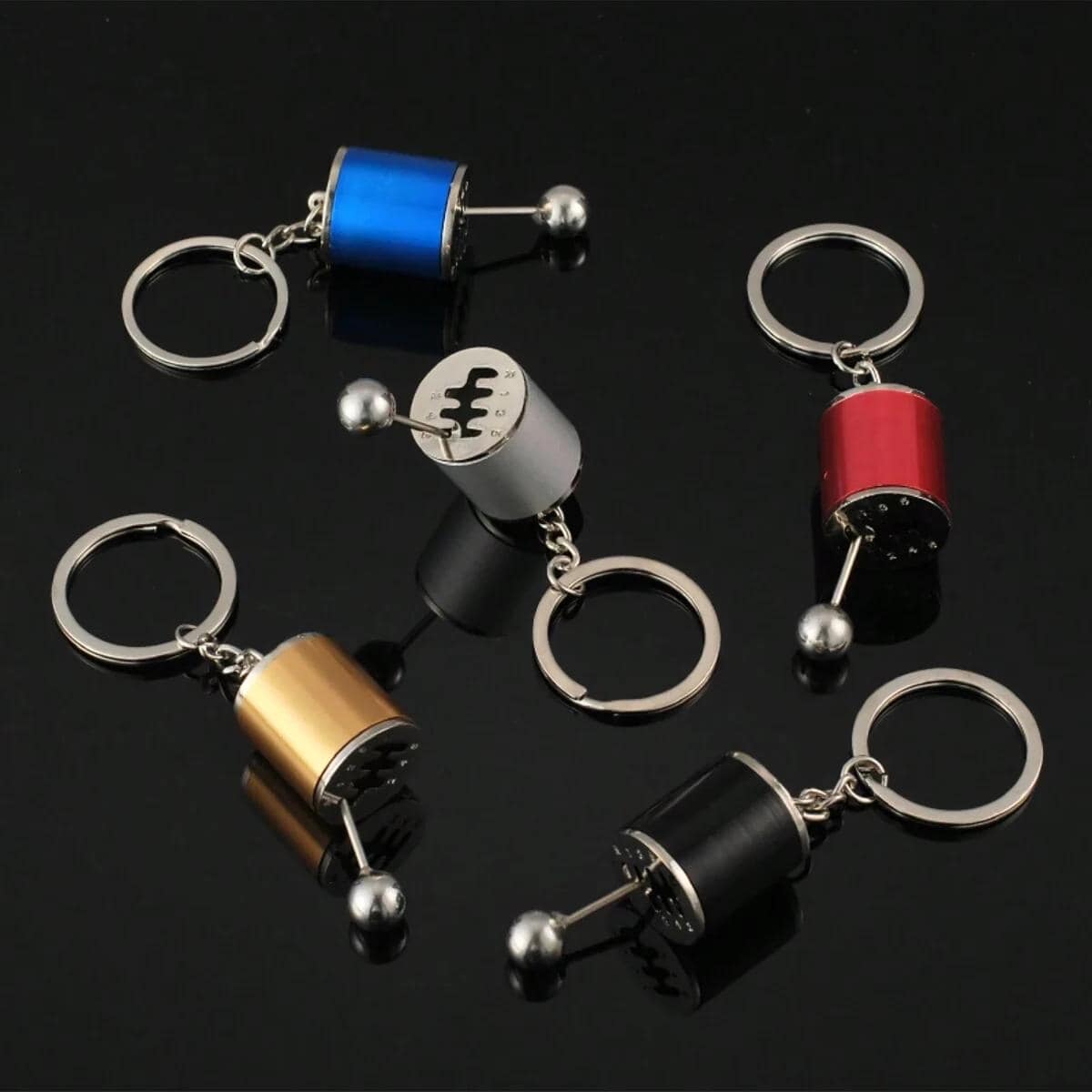 Highly detailed image of multicolored optometric-inspired keychains featuring cylindrical shapes and metallic accents, ideal for footwear or accessories.