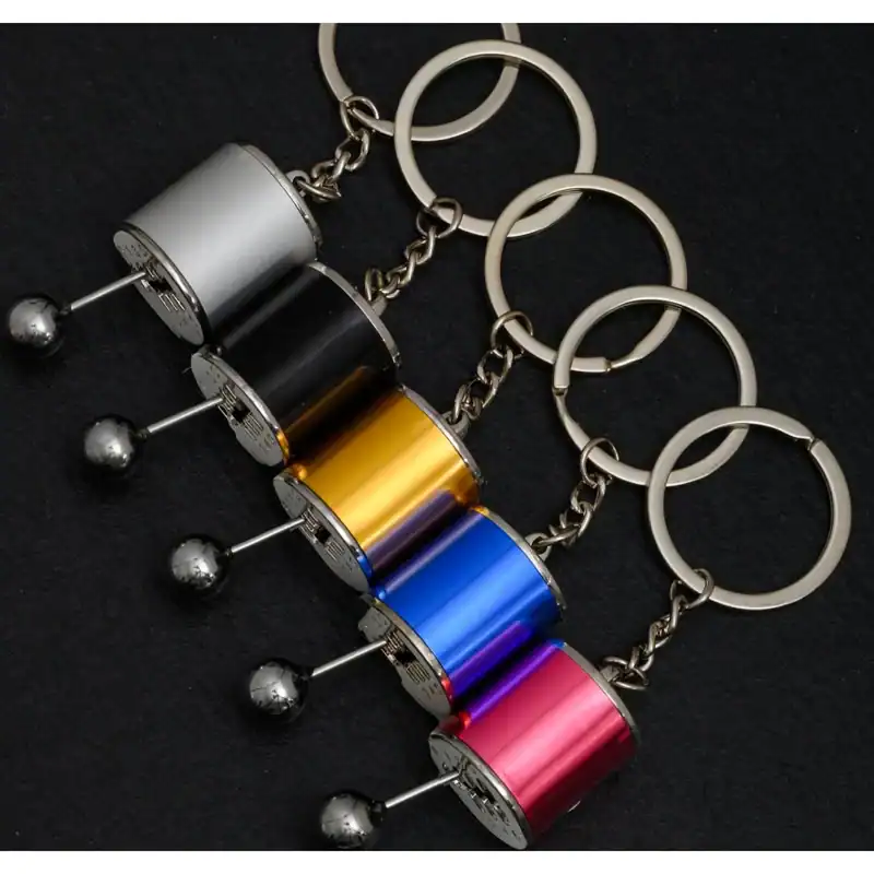 Keychain accessories with metallic finish in multiple vibrant colors, ideal for gifts, promotional items, or personal use. Features silver rings and sturdy chain links suited for stylish, trendy, and functional key holders.