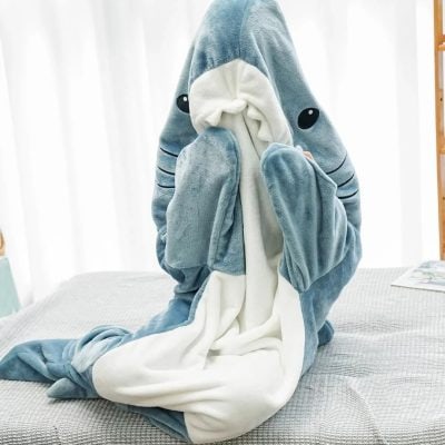 Soft, cozy shark-themed plush blanket for children with adorable ocean design, perfect for bedtime and relaxation. Made from high-quality, comfortable fabric for ultimate warmth and comfort.