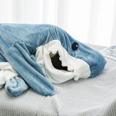Cute dolphin-shaped plush toy with soft blue and white fabric, perfect for children and collectors. Adds a playful touch to home decor or gift-giving. High-quality, cuddly, and ideal for imaginative play.