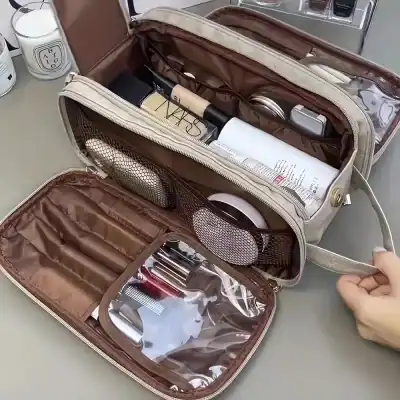 Makeup bag organizer for cosmetics and travel toiletries, featuring compartments for brushes, bottles, and personal care essentials, perfect for on-the-go lifestyle.