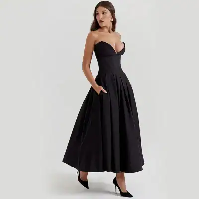 Elegant black evening gown with strapless sweetheart neckline, fitted bodice, and full flowy skirt, perfect for special occasions and formal events.
