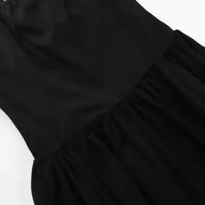 High-quality black dress featuring stylish ruffled sleeves, perfect for casual or formal occasions. Made from comfortable, durable fabric for a sleek and sophisticated look.