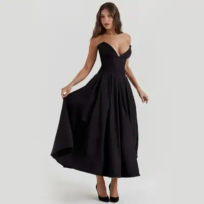 Elegant black formal gown with deep neckline, perfect for special occasions and events. Made with high-quality fabric, featuring a flattering fit and flowing skirt for a sophisticated look.