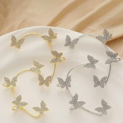 Luxurious butterfly bracelets in gold and silver adorned with glittering crystals, available at Monalisa Store. Perfect for adding a touch of elegance and sophistication to your jewelry collection.