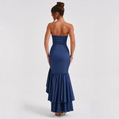 Stunning blue strapless gown with a ruffled mermaid hemline, ideal for formal parties and weddings. Elegant and figure-flattering, this dress combines fashion and comfort.