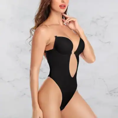 Elegant black body suit with cut-out design, perfect for fashionable and trendy lingerie or clubwear. Made for comfort and style, ideal for date nights or special occasions.