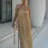 Stylish beige pleated dress with unique shoulder rope design for women at Monalisa Medical.