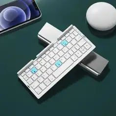 Stylish white mini wireless keyboard with blue highlighted keys, touchpad, and compact design ideal for tablets and smartphones.