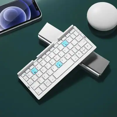 Stylish white mini wireless keyboard with blue highlighted keys, touchpad, and compact design ideal for tablets and smartphones.