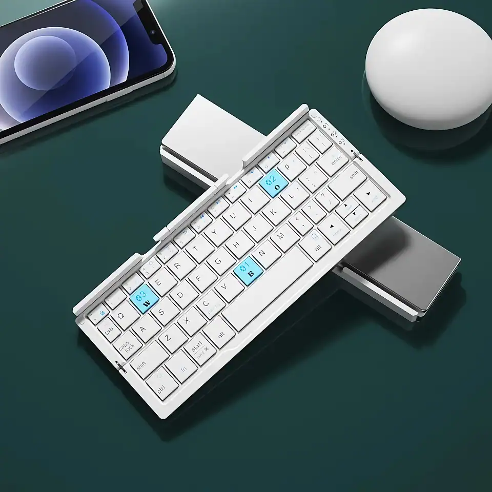 Stylish white mini wireless keyboard with blue highlighted keys, touchpad, and compact design ideal for tablets and smartphones.