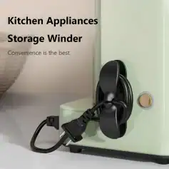 Black kitchen appliance cord winder plugged into power outlet, designed for kitchen appliances to organize cords, prevent clutter, and enhance convenience in i nmodern kitchen spaces.