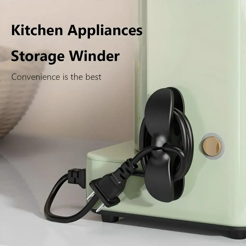 Black kitchen appliance cord winder plugged into power outlet, designed for kitchen appliances to organize cords, prevent clutter, and enhance convenience in i nmodern kitchen spaces.