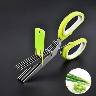 Sharp kitchen scissors with integrated green vegetable peeler for easy chopping and peeling of vegetables. Ideal for precise culinary prep and versatile kitchen tool.