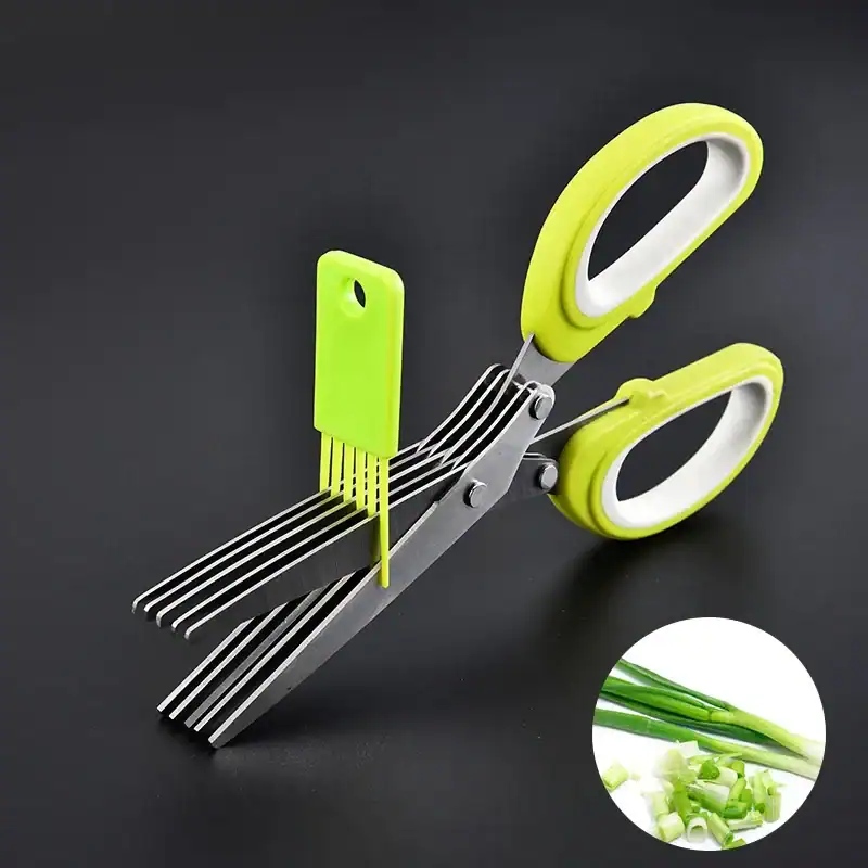 Sharp kitchen scissors with integrated green vegetable peeler for easy chopping and peeling of vegetables. Ideal for precise culinary prep and versatile kitchen tool.